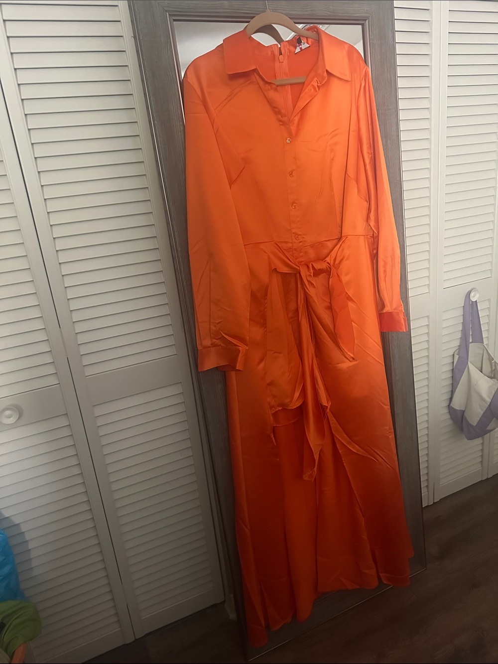 Vibrant Orange Satin Button-Front Maxi Dress
Patrick Starr - Picture 2 of 3